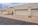 View of attached garage with additional parking spaces at 7764 N 19Th Dr, Phoenix, AZ 85021