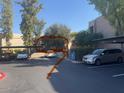 Condo parking lot with designated parking spaces at 7777 E Main St # 215, Scottsdale, AZ 85251