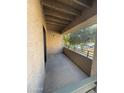 Private patio with covered area and view of trees at 7777 E Main St # 215, Scottsdale, AZ 85251