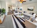 Bright and airy living room with stylish furniture and a cozy atmosphere at 8148 W Atlantis Way, Phoenix, AZ 85043