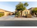 Two-story house with a three-car garage and palm trees at 850 E Del Rio St, Chandler, AZ 85225