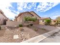 Charming home with landscaped yard and stone accents at 8725 E Indigo St, Mesa, AZ 85207