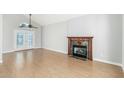 Living room with hardwood floors and a fireplace at 1209 N Newport St, Chandler, AZ 85225