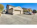 Large driveway with space for multiple vehicles at 14206 W Mandalay Ln, Surprise, AZ 85379