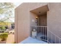 Building exterior, showing entrance with small patio at 16616 E Palisades Blvd # 201, Fountain Hills, AZ 85268