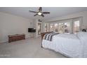 Bright bedroom with large windows and plush carpeting at 19122 N 90Th Dr, Peoria, AZ 85382