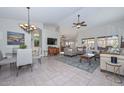 Spacious living area with tile floors and ample natural light at 19122 N 90Th Dr, Peoria, AZ 85382