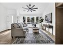 Bright and airy living room with bay window and stylish furnishings at 1914 E Golden Ct, Chandler, AZ 85225