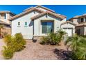 Two-story house with a landscaped yard and driveway at 25822 W Magnolia St, Buckeye, AZ 85326