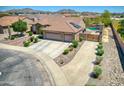 Single story home with a three car garage, sparkling pool and solar panels at 3818 N Kalispell Ct, Casa Grande, AZ 85122