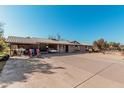 House with carport and boat storage at 4035 W Country Gables Dr, Phoenix, AZ 85053