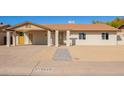 Charming single-story home featuring a covered carport and desert landscaping at 4220 W State Ave, Phoenix, AZ 85051