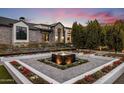 Elegant home entrance with a captivating water fountain at 5712 E Calle Camelia --, Phoenix, AZ 85018