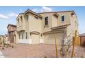 Two-story home with well-manicured landscaping and a three car garage at 5857 S Romano --, Mesa, AZ 85212