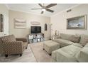 Bright living room with sectional sofa and plenty of natural light at 9151 W Greenway Rd # 276, Peoria, AZ 85381