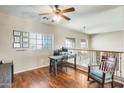 Upstairs office with wood floors and a view of the living room at 14869 W Cortez St, Surprise, AZ 85379