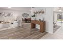 Entryway with wood console table and view to living area at 2415 E Cochise Rd, Phoenix, AZ 85028