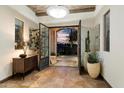 Elegant entryway with beautiful hardwood floors and arched doorway at 8124 E Paraiso Dr, Scottsdale, AZ 85255