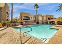 Beautiful community pool featuring clear blue water and meticulously maintained landscaping, perfect for relaxation at 8245 E Bell Rd # 142, Scottsdale, AZ 85260