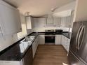 Spacious kitchen with stainless steel appliances and dark countertops at 8832 E Pueblo Ave # 29, Mesa, AZ 85208