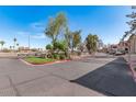 Gated entrance to the community with parking and landscaping at 10610 S 48Th St # 2096, Phoenix, AZ 85044