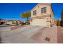 Two-story house with a two-car garage and American flag at 11830 W Avenida Del Sol --, Sun City, AZ 85373