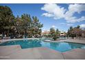 Inviting community pool with surrounding lounge chairs at 1351 N Pleasant Dr # 2172, Chandler, AZ 85225