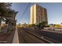 High-rise building exterior with light-rail access nearby at 2323 N Central Ave # 504, Phoenix, AZ 85004