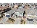 Two-story house aerial view, showing the neighborhood and landscaping at 35298 W San Ildefanso Ave, Maricopa, AZ 85138