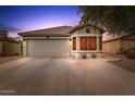 Curb appeal abounds at this charming one-story home featuring a two-car garage at 40136 N Costa Del Sol Dr, San Tan Valley, AZ 85140