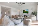 Cozy living room features a fireplace and comfortable seating at 4752 S Orbit Ave, Mesa, AZ 85212