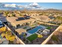 Luxury home with pool, spa, solar panels, and mountain views at 4907 W Faull Dr, New River, AZ 85087