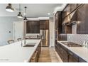 Spacious kitchen with stainless steel appliances and custom cabinetry at 7363 E Casitas Del Rio Dr, Scottsdale, AZ 85255