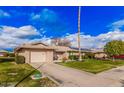 House exterior with driveway and landscaping, street view at 9920 W Shasta Dr, Sun City, AZ 85351