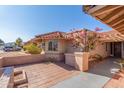 Charming courtyard entry with brick pavers and bougainvillea at 10662 N 33Rd Pl, Phoenix, AZ 85028