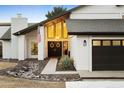 Two-story home featuring a striking entryway and walkway at 13026 N 12Th Ave, Phoenix, AZ 85029
