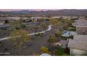 Community and home aerial view showcasing desert landscape, pool, and fire pit at 17848 E Stocking Trl, Rio Verde, AZ 85263