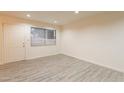 Simple entryway with tile floors and white door at 8446 N 34Th Dr, Phoenix, AZ 85051