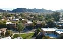 Aerial view of community with mountain backdrop at 10419 N 10Th Pl # 2, Phoenix, AZ 85020