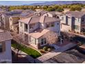 Charming home with a balcony, desert landscaping, and a red tile roof at 17749 W Woodrow Ln, Surprise, AZ 85388