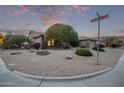 House with a two-car garage and gravel landscaping, street view at 17802 N Bridle Ln, Surprise, AZ 85374