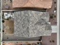 Aerial shot of a home with desert landscaping and block wall fencing at 2022 W Briana Way, Queen Creek, AZ 85144