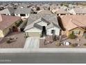 Picture of a single-story home with desert landscaping and a neutral-colored roof at 2022 W Briana Way, San Tan Valley, AZ 85144