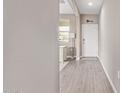 Bright and airy entryway with wood-look tile flooring at 36582 N Lincoln Red Rd, San Tan Valley, AZ 85143