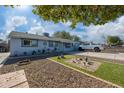 Newly painted home with attractive landscaping and driveway at 3707 W Encanto Blvd, Phoenix, AZ 85009