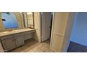 Bathroom with vanity, sink, and tiled floor at 5124 W Onyx Ave, Glendale, AZ 85302