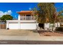 Charming two-story home with three-car garage and balcony in a well-maintained neighborhood at 6422 W Garden Dr, Glendale, AZ 85304