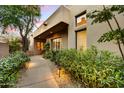 Inviting walkway to the home's entrance, beautifully landscaped at 7500 E Boulders Pkwy # 11, Scottsdale, AZ 85266