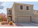 Two-story house with a two-car garage and neutral color scheme at 8827 W Dahlia Dr, Peoria, AZ 85381