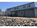 Charming two-story home with a covered entryway and freshly painted exterior at 925 W Fairway Dr, Mesa, AZ 85201